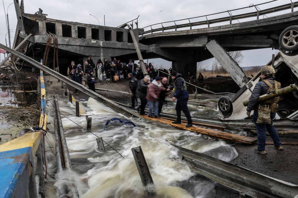 Ukraine decries ‘immoral’ stunt after Moscow says it will let civilians flee to Russia