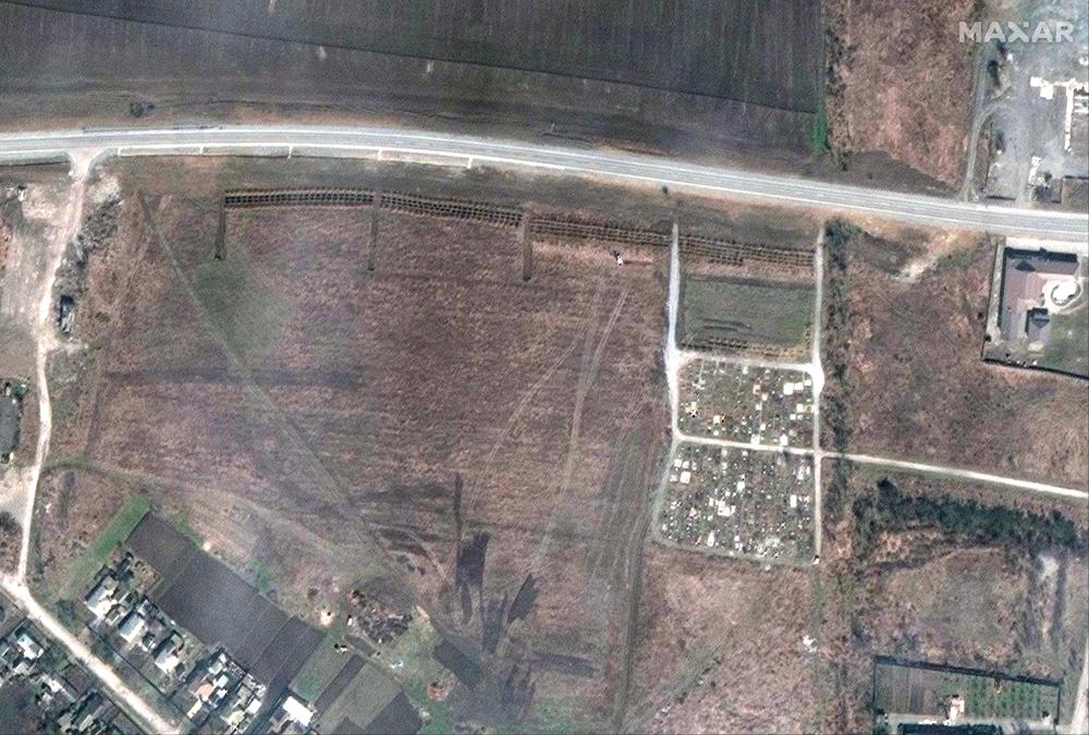 Possible mass graves near Mariupol shown in satellite images