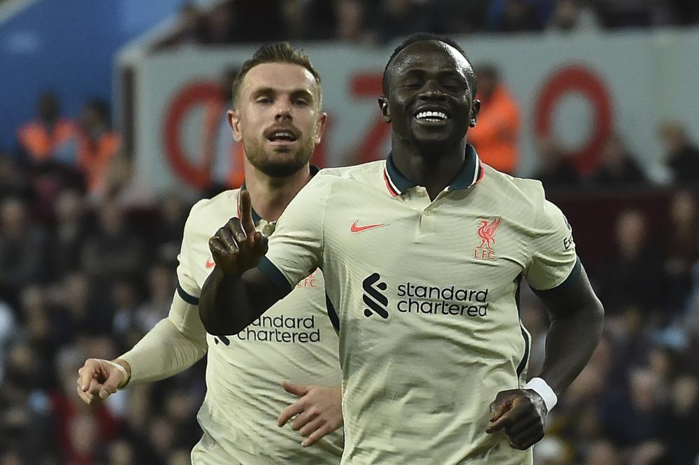 Liverpool beats Villa 2-1, level on points with City in EPL