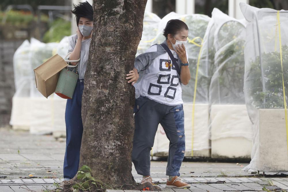 China, Japan ground ferries, flights as typhoon approaches