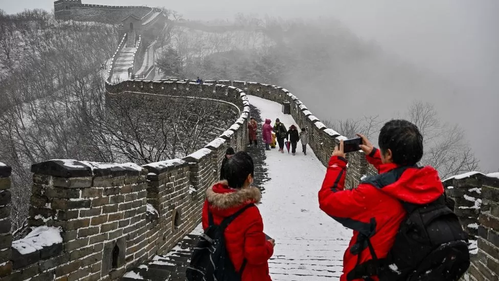 China reopening borders to foreign tourists for first time since Covid erupted
