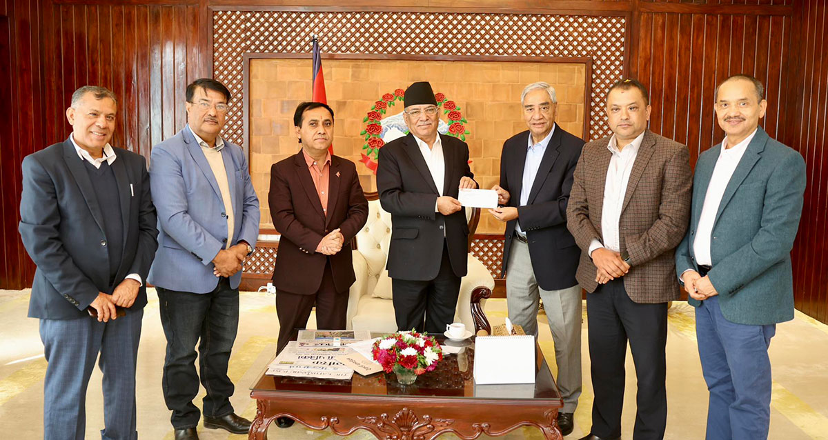NC hands over cheque of Rs 5 mln to PM Dahal for relief of quake-affected people